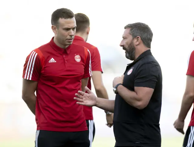 Aberdeen manager Derek McInnes (right) and Andrew Considine
