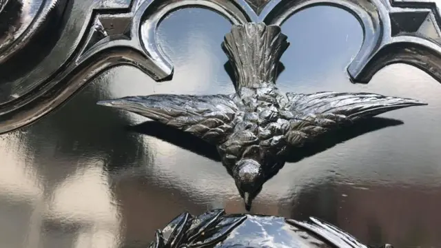 Carving on the hearse
