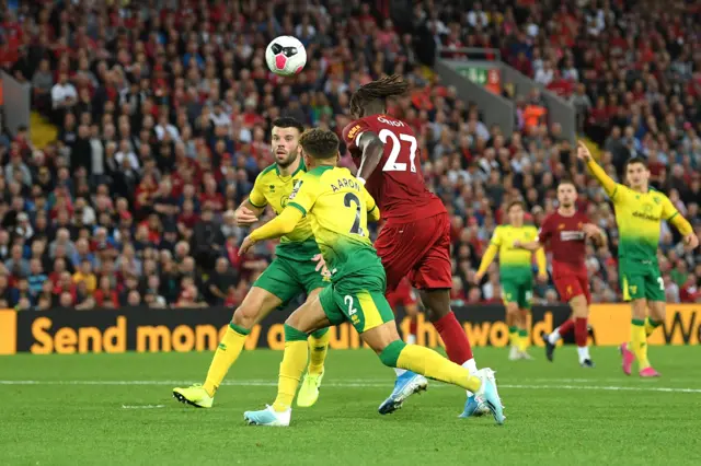 Divock Origi heads in Liverpool's fourth goal