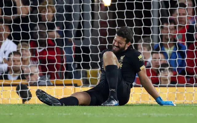 Alisson in pain