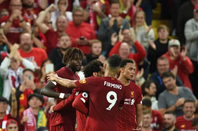 Fans celebrate after Divock Origi's fourth goal