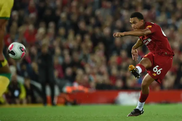 Trent Alexander-Arnold fires a free kick towards goal