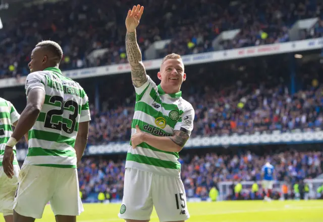 Jonny Hayes celebrates his stoppage-time goal at Ibrox