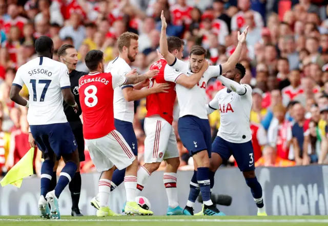 Sokratis Papastathopoulos and Harry Winks