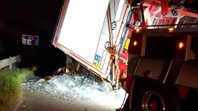 A lorry with smashed glass