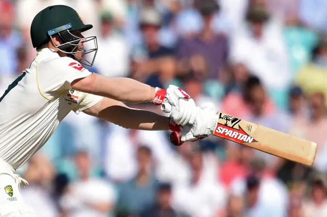 David Warner attempts to play a shot during play on the second day of the fifth Ashes cricket Test match between England and Australia at The Oval