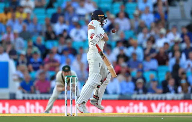 Rory Burns is hit in the grille by the ball during day two of the fifth test match at The Oval