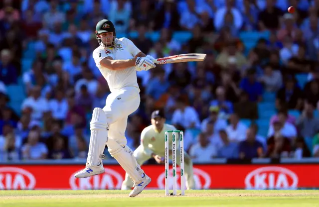 Australia's Mitchell Marsh hits the ball which is caught by England's Jack Leach (not pictured) during day two of the fifth test match at The Oval