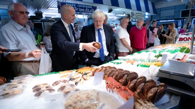 Boris Johnson at a fish market