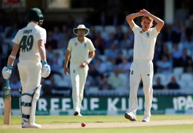 England's Sam Curran reacts after bowling to Australia's Steve Smith