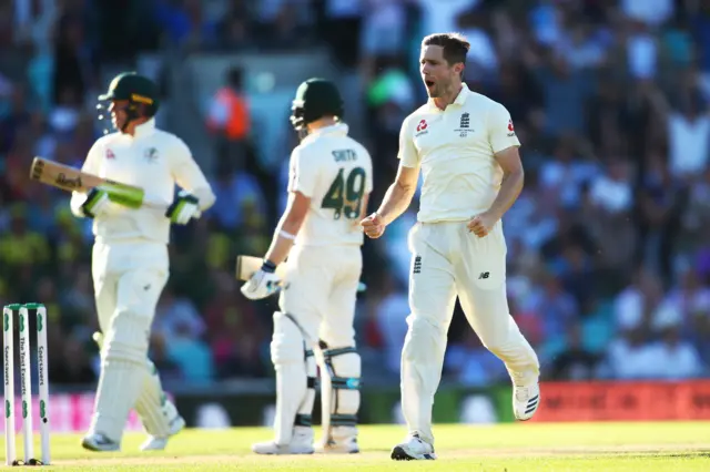 Chris Woakes of England celebrates dismissing Steve Smith of Australia during day two of the 5th Specsavers Ashes Test between England and Australia at The Kia Oval