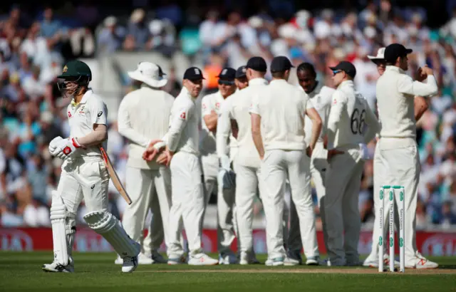 Australia's David Warner leaves the field after being caught out by England's Jonny Bairstow off the bowling of Jofra Archer