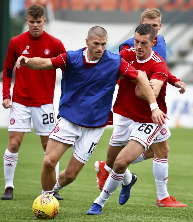 Hamilton's Alex Gogic and Sam Stubbs warm up