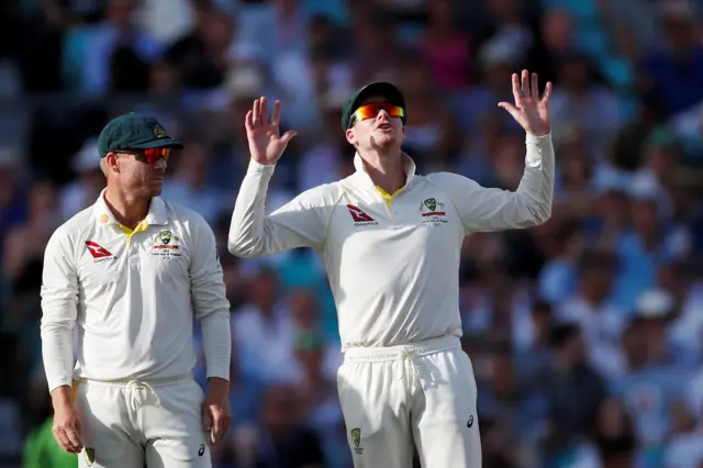 Steve Smith reacts after catching out England's Jonny Bairstow