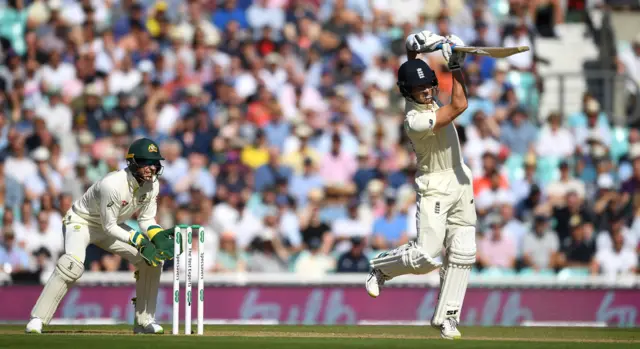 Joe Denly of England hits down the ground for six runs during day three of the 5th Specsavers Ashes Test between England and Australia at The Kia Oval