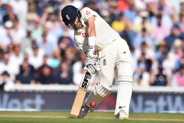 Joe Denly hits a four during play on the third day of the fifth Ashes cricket Test match between England and Australia at The Oval