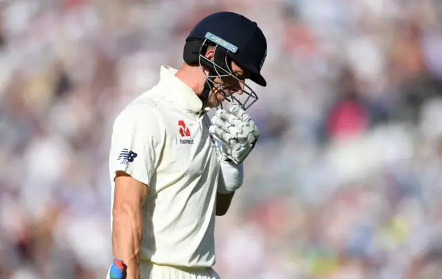 Joe Denly of England leaves the field after being dismissed for 94 runs by Peter Siddle of Australia during day three of the 5th Specsavers Ashes Test between England and Australia at The Kia Oval