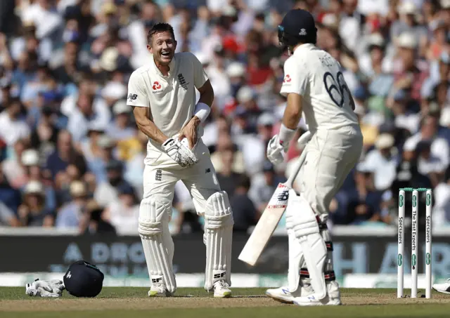 Joe Denly of England checks his protector after being struck in the groin during day three of the 5th Specsavers Ashes Test between England and Australia at The Kia Oval