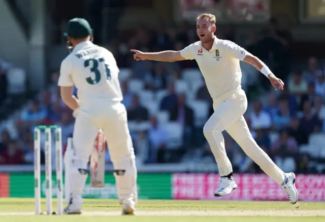 England's Stuart Broad celebrates taking the wicket of Australia's David Warner during day four of the fifth test match at The Kia Ova