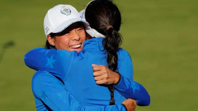 Celine Boutier is congratulated by Georgia Hall