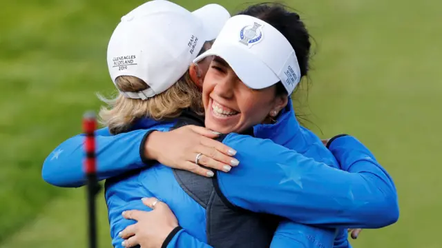 Georgia Hall hugs captain Catriona Matthew