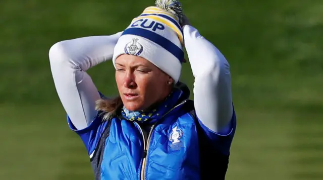 Suzann Pettersen reacts after missing a long putt to win the 17th