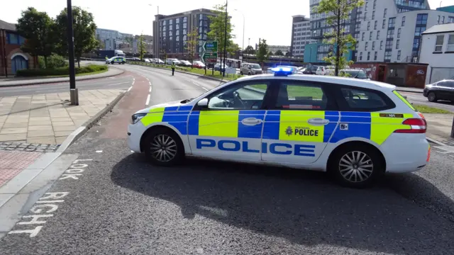 A police car at the scene