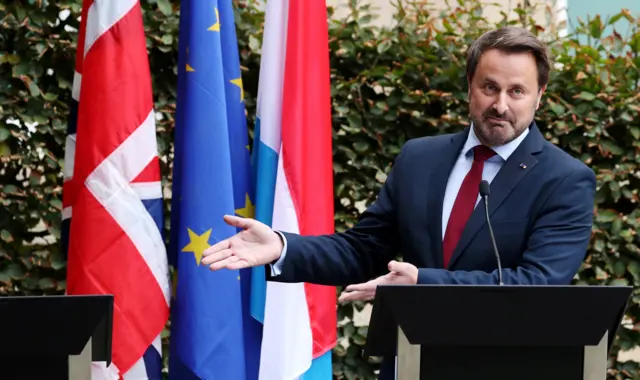 Luxembourg"s Prime Minister Xavier Bettel gestures at a news conference after his meeting with British Prime Minister Boris Johnson in Luxembourg