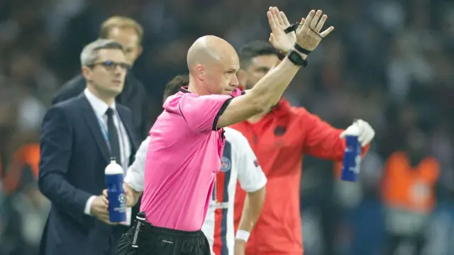 British referee Anthony Taylor cancels the goal by Real Madrid's Welsh forward Gareth Bale