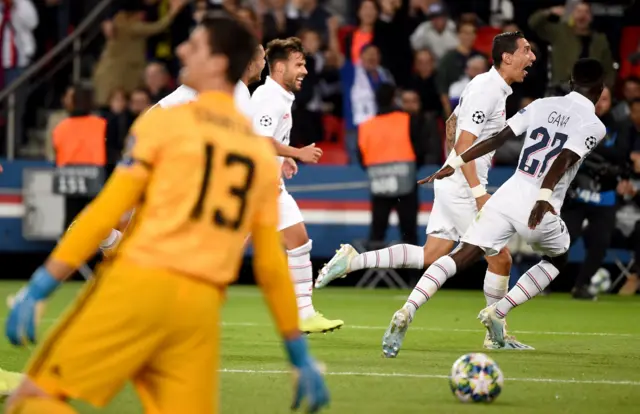 Angel di Maria celebrates scoring Paris St Germain's second goal against Real Madrid