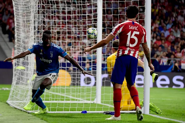 Blaise Matuidi celebrates scoring as the Atletico defence watch the ball settle in the net