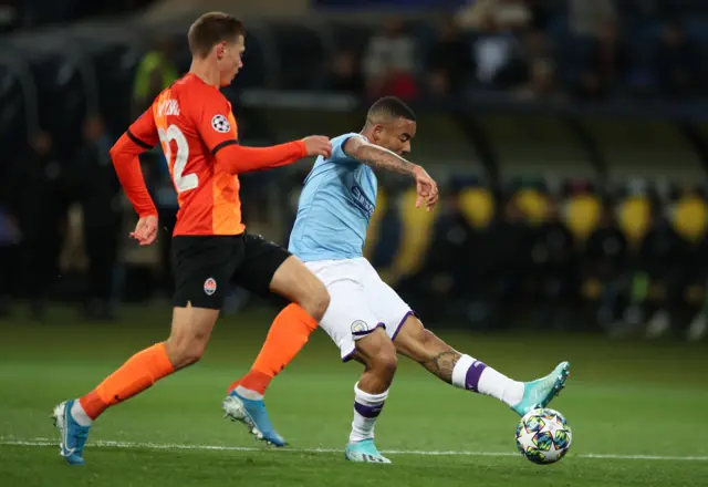 Gabriel Jesus rolls the ball across goal to score Manchester City's third goal