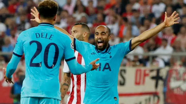 Lucas Moura celebrates with Dele Alli