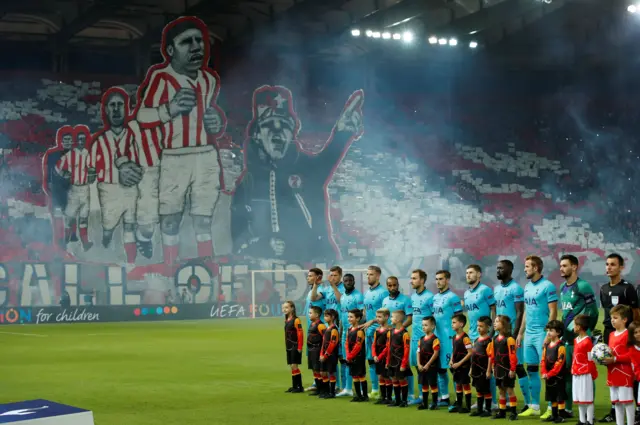 Pre-match scene, including a huge mural