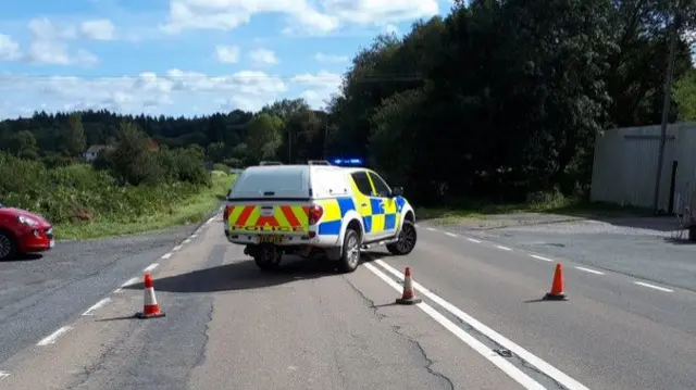 Police car blocking A44