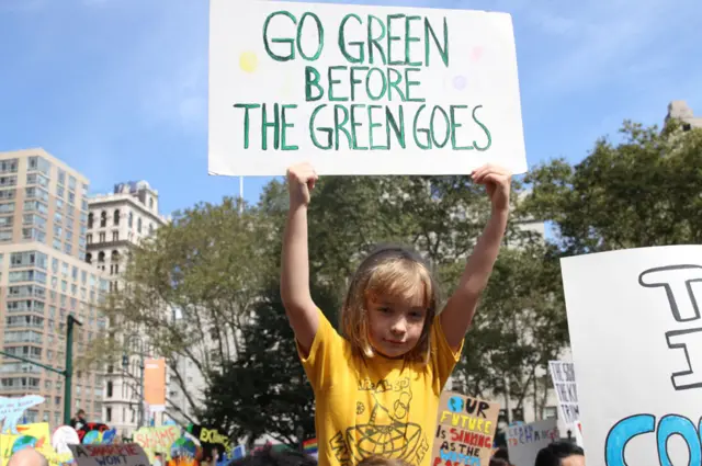 Girl with sign