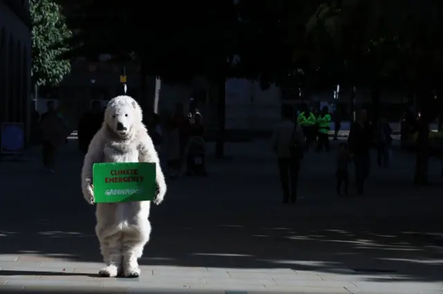 Protester in a polar bear costume in Manchester