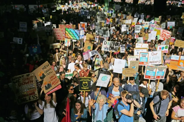 Crowd of protesters marching in London