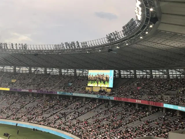 Fans in Japan rugby shirts