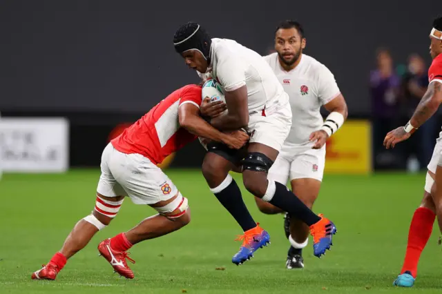 Maro Itoje is tackled