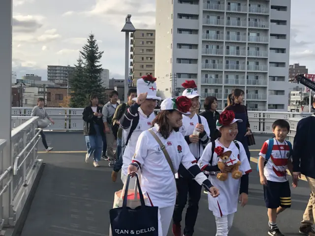 Japanese fans in England kit