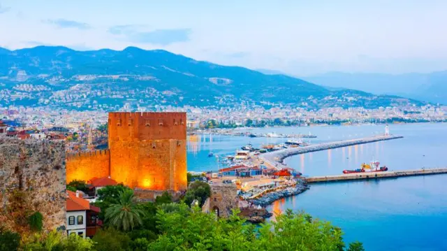 View of Alanya and harbour at sunset. Turkey