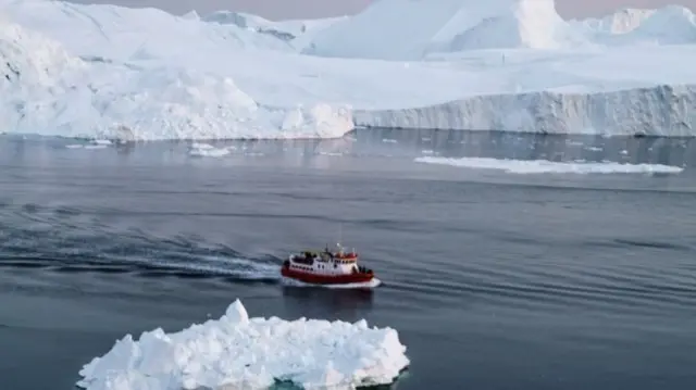 Boat and iceberg