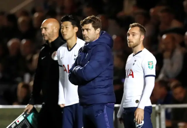 Mauricio Pochettino and substitutes Son Heung-min and Christian Eriksen