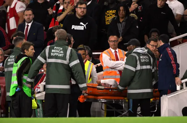 Emile Smith-Rowe is stretchered off