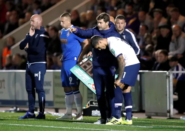 Tottenham manager Maurico Pochettino sends on Erik Lamela