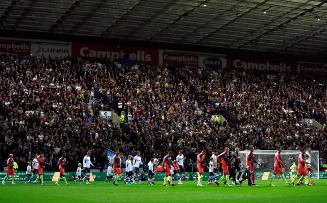 Players come out at Deepdale