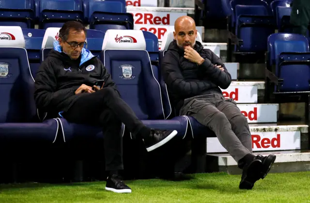 Pep Guardiola in the Preston dug-out