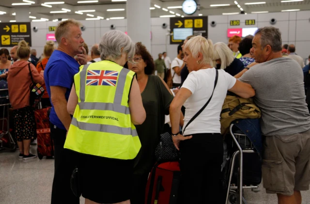 Thomas Cook passengers arrive at Palma airport in Mallorca