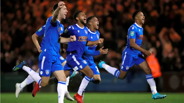 Colchester players celebrate